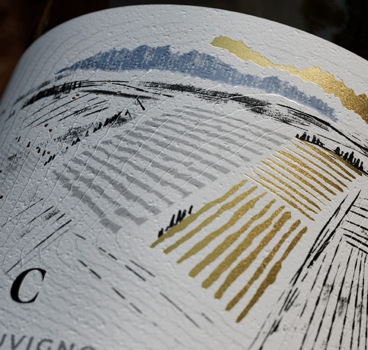 Close-up of a wine bottle label, showing the grape, region and vintage details to check on a Moldovan wine label.